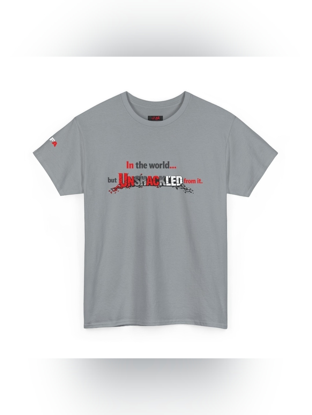 Unisex Tee — "In the world... but UNSHACKLED from it.know it." Graphic Tee